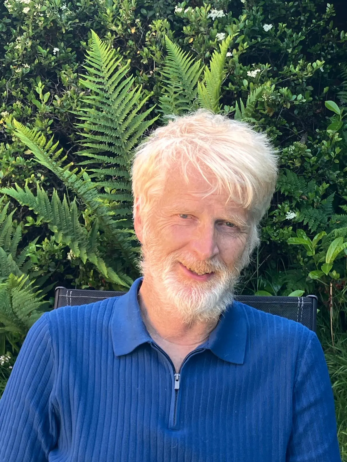A headshot of Gordon, the software engineer at HelloHorizon.